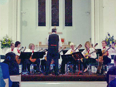 Hampshire Guitar Orchestra in a concert with West Sussex Guitar Club